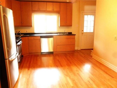 Kitchen. New oak hardwood floors, stainless applia