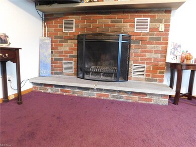 Wood burning fireplace in Living Room