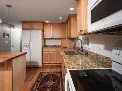 The rich maple cabinets,oak floors,...