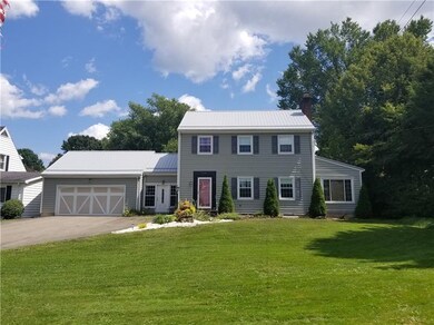 Front Exterior with attached garage.