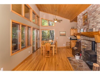 Open & airy living room & informal dining room wit
