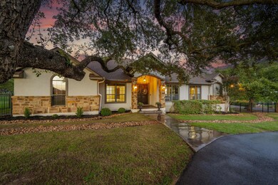 View of front of home with stone siding and stucc