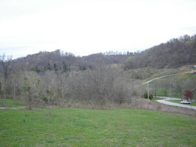 On the corner of the lot on Beverly Drive.