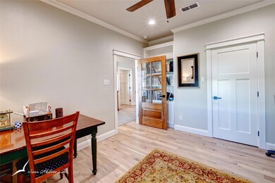 Office area featuring light hardwood / wood-style 