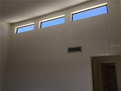 Master bedroom has cathedral ceiling with three up