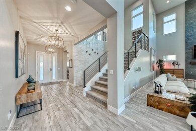 Entryway features gorgeous stacked stone wall