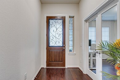 Office with French doors on the right.