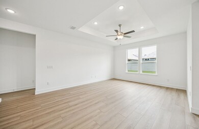 Gathering room drenched in natural light, creating a warm atmosphere  *Real home pictured