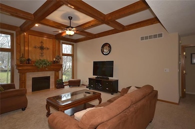 Beautiful spacious great room with boxed beam ceil