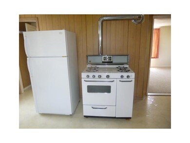 Kitchen. Stove has heating element that heats enti