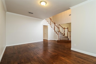 Unfurnished room featuring ornamental molding and 