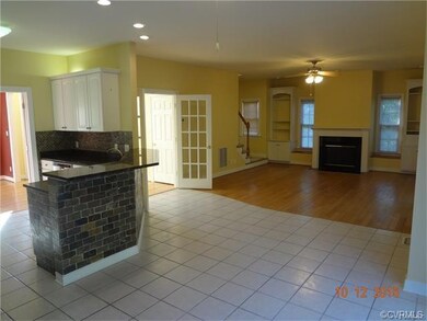 Eat-in kitchen overlooking family room with built-