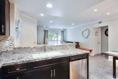 Kitchen opens to the living and ding room.