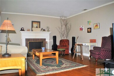 Living room with wood burning fireplace