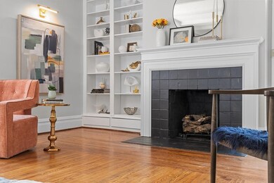 A tiled, gas fireplace