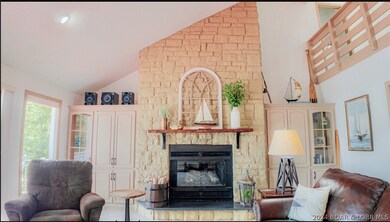 2 story stone fireplace.