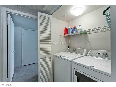 Washroom featuring independent washer and dryer an