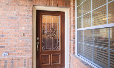 As you approach the front porch, you'll be impress