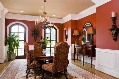 The 18x14 dining room features arched windows, recessed lighting and beautiful crown moldings. A great gathering place for large families around the holidays but warm enough for every day use.