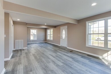 Another view of the spacious living room.