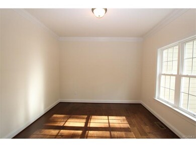 Living Room with two member crown molding and engi