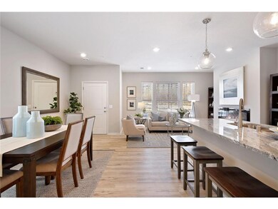 The sunlit family room and dining room offer open-