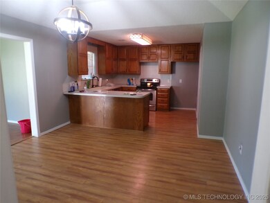 Roomy kitchen with room for large dining table.