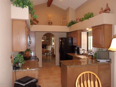 Vaulted ceilings with plant shelf