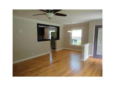 Living Room. Gleaming refinished hard wood floorin
