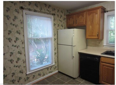 KITCHEN   breakfast area left of window.