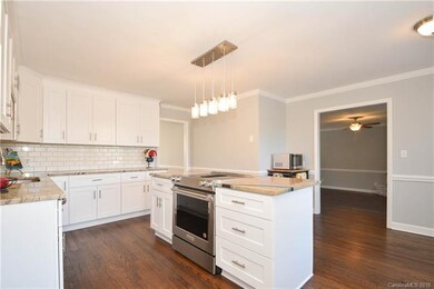 Kitchen is spacious and opens to family room.