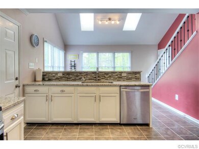 With Stainless appliances and beautiful tile back 