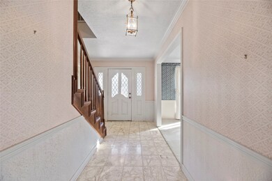 An alternate view of the gorgeous front foyer, wit
