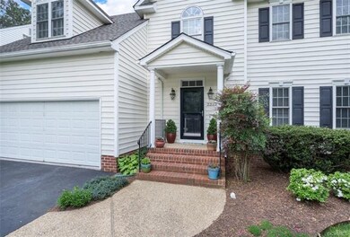 Tons of curb appeal!  Vinyl siding.  Brand new roof & gutters.  Two car, direct entry garage.