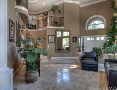 Enjoy the travertine flooring throughout.