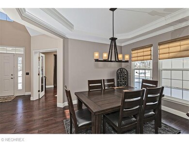 The foyer opens up to the formal dining room and f
