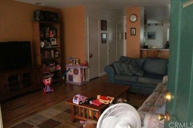 Entering front door into living room.