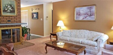 Living room, dining room and hallway feature crown
