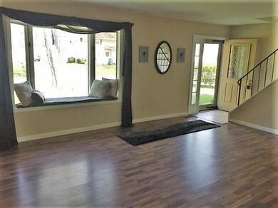Bay window, laminate floors, fresh paint!