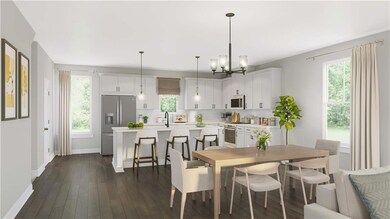 Virtually staged!Kitchen area is seamlessly integr
