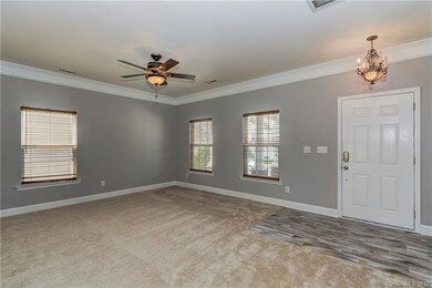 Large open space that could be dining room, office