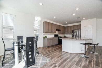 This spot, left, is perfect as a breakfast/casual dining nook, just footsteps from your easily workable kitchen.