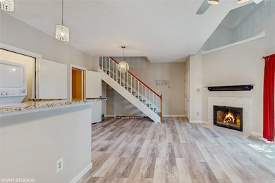 This is a charming townhouse with a brick exterior