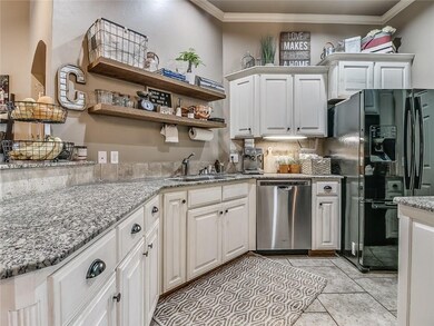 Kitchen-- The kitchen is well appointed with white