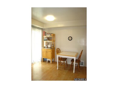 Eating area of kitchen with slider to large deck &