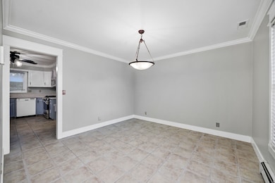 Formal dining area featuring crown molding, baseboard heating, a ceiling fan, and light tile patterned flooring