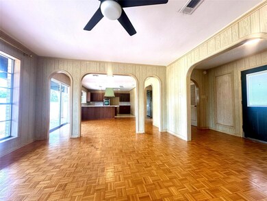 Unfurnished living room with light parquet floorin