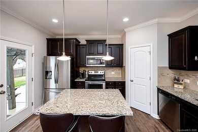 Stainless steel appliances, island and walk in pan
