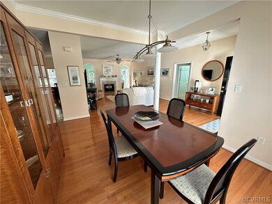 Dining space with ceiling fan, plenty of natural l