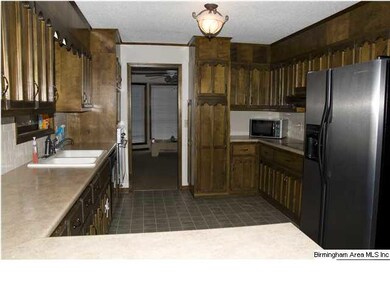another view of Kitchen...lots of cabinets!